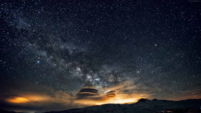 Milky Way Galaxy and Stars over Mountains
