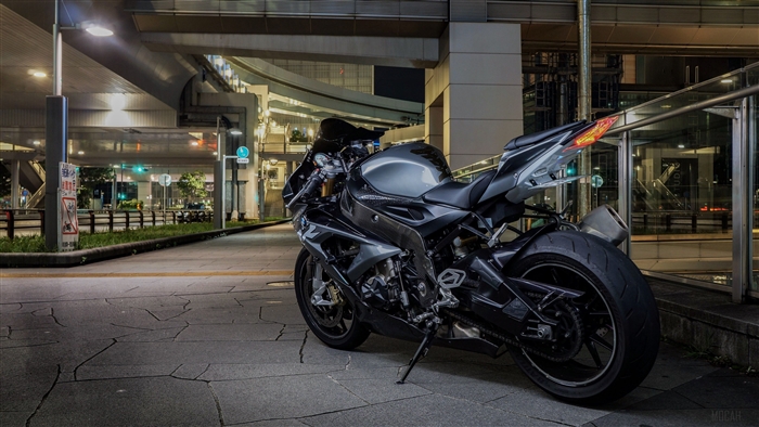 BMW S1000RR motorcycle parked at night