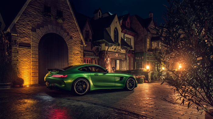 Green Mercedes AMG GT R parked at night