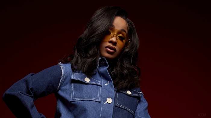 Cardi B in denim jacket and sunglasses