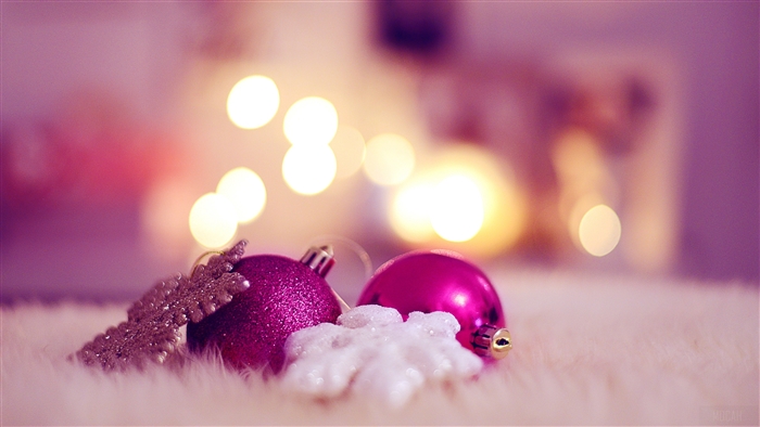 Christmas ornaments and snowflakes with bokeh lights