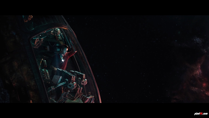 Tony Stark in a spaceship cockpit in space