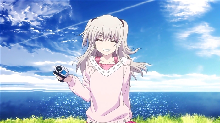 Nao Tomori from Charlotte holding a camcorder