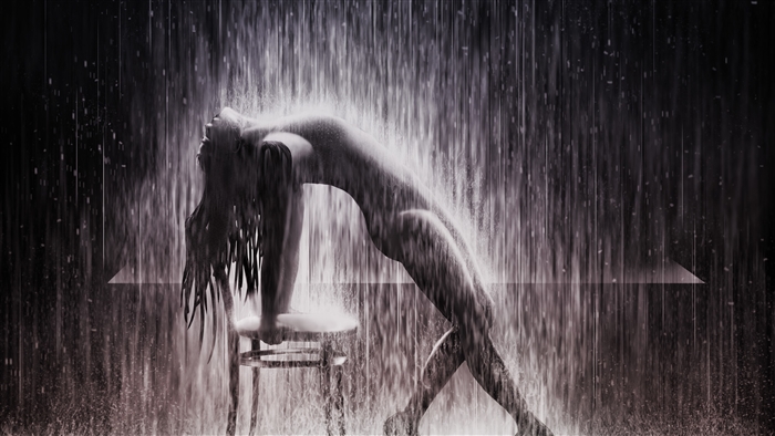 Woman dancing in the rain