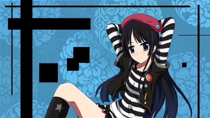 Girl in striped shirt and beret posing