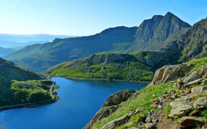 Mountain lake with rocky slopes and peaks