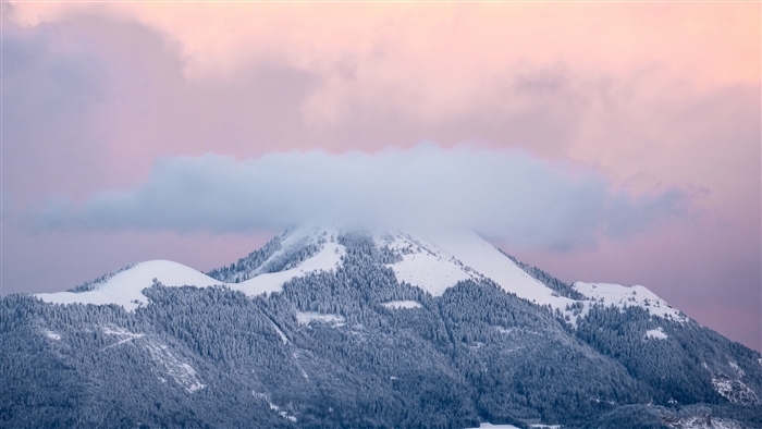 Snow-covered mountains with pink clouds 4K