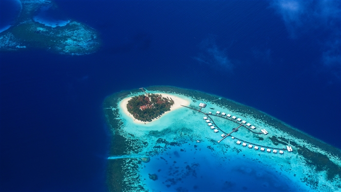 Aerial view of a tropical island resort in the ocean