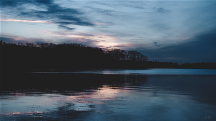 Lake at dusk with clouds and reflection 4K