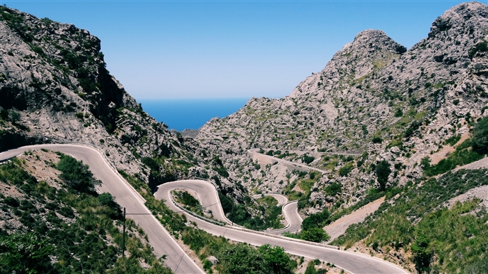 Winding Mountain Road with Scenic Landscape