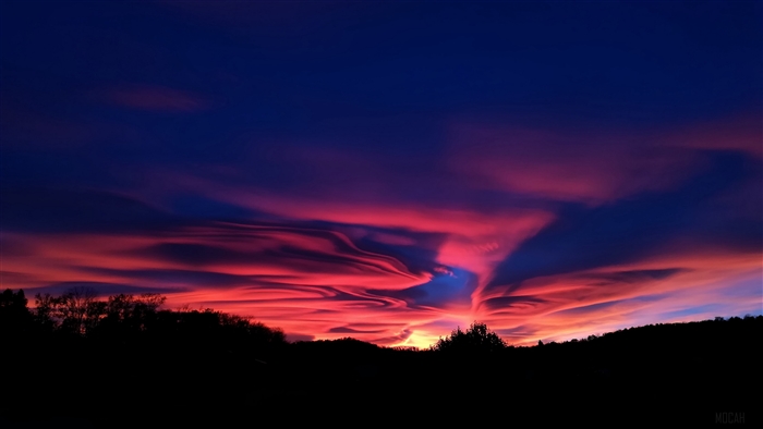 Dramatic sunset sky with vibrant clouds 4K