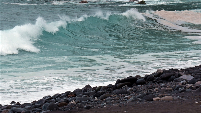 Atlantic Ocean waves crashing on a rocky beach 4K