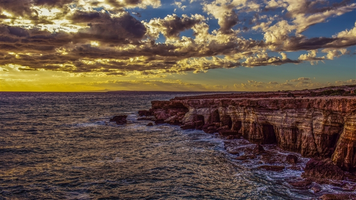 Cliff and Sea at Sunset