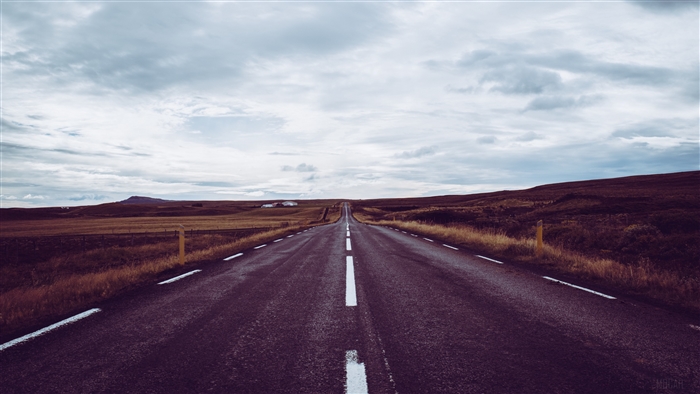 Empty Road with Markings and Cloudy Sky 4K