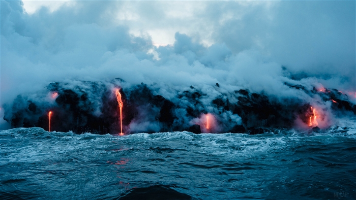 Lava flows into the sea from a volcano