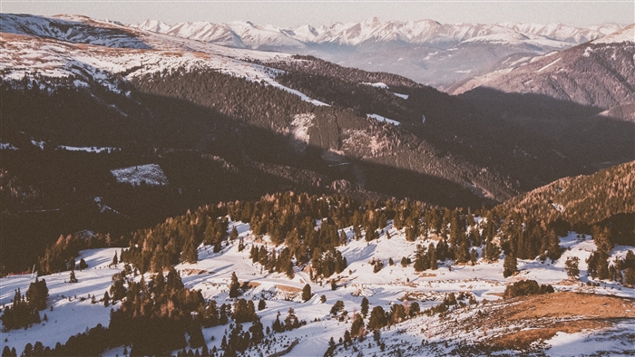 Snowy mountains and valley in winter 4K