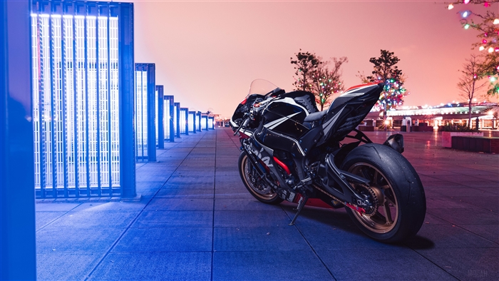 Kawasaki ZX10R motorcycle at night with lights