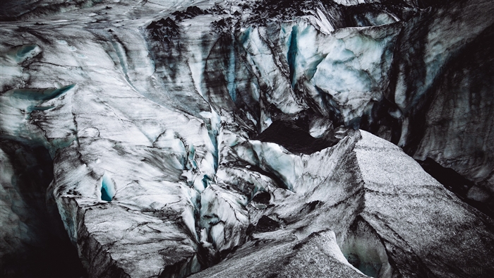 Glacier surface with blue ice caves in Iceland 4K