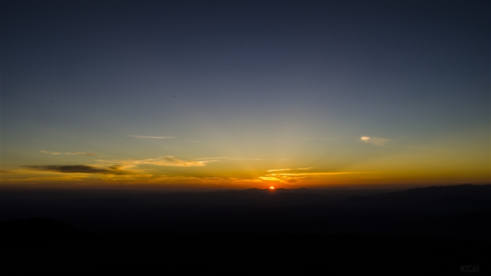 Sunrise over dark mountains 4K