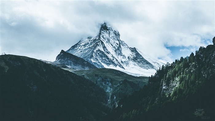 Matterhorn mountain with fog and clouds