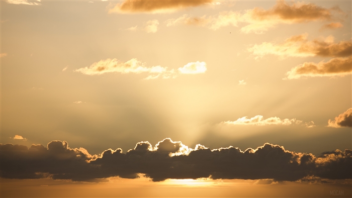 Sunset sky with sun rays and clouds 4K