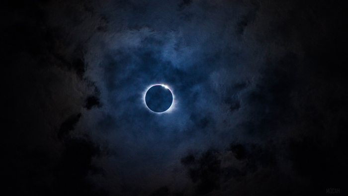 Solar eclipse with clouds 4K