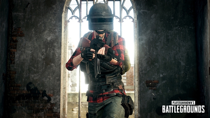 PlayerUnknown's Battlegrounds character with helmet and rifle