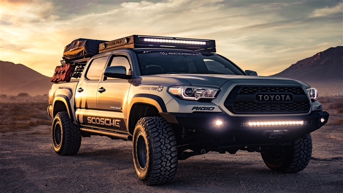 Toyota Tacoma 4x4 with rooftop tent and lights 4K