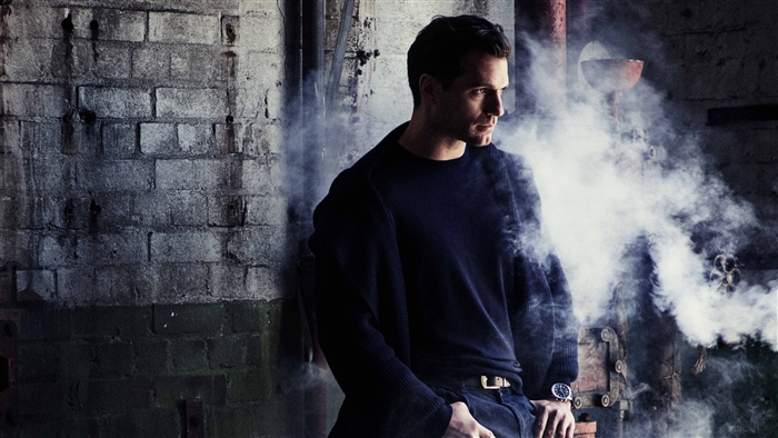 Henry Cavill in industrial setting with steam