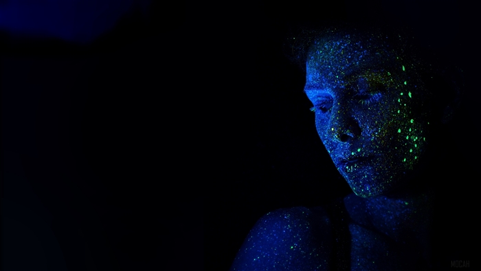 Woman with UV face paint