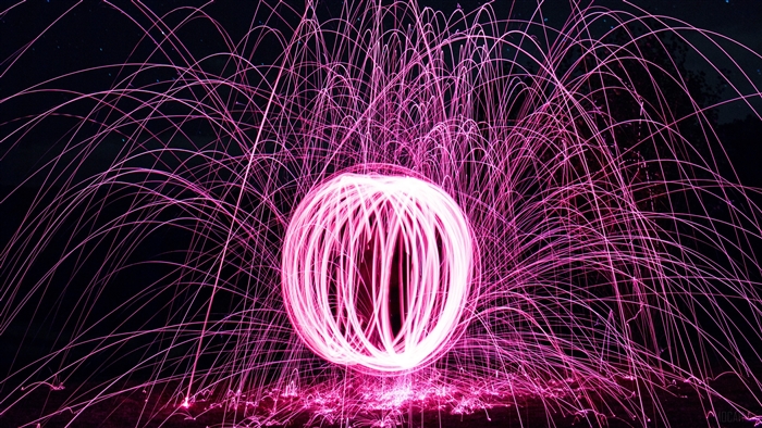 Light art ball with pink rays and glitter 4K