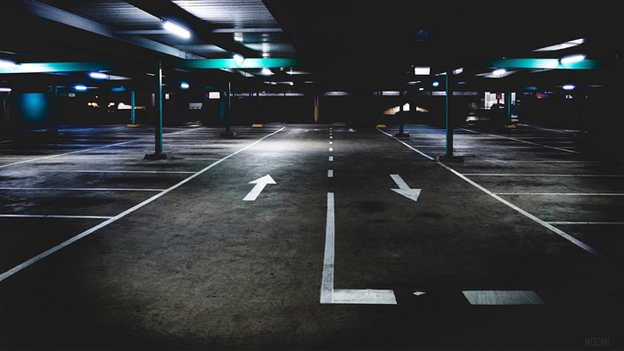 Empty underground parking lot with markings