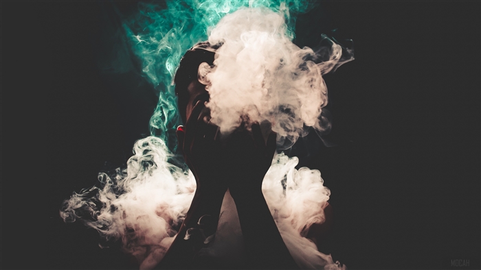 Man with colorful smoke 4K
