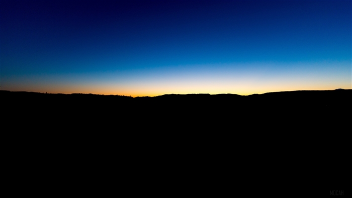 Sunset over a dark horizon