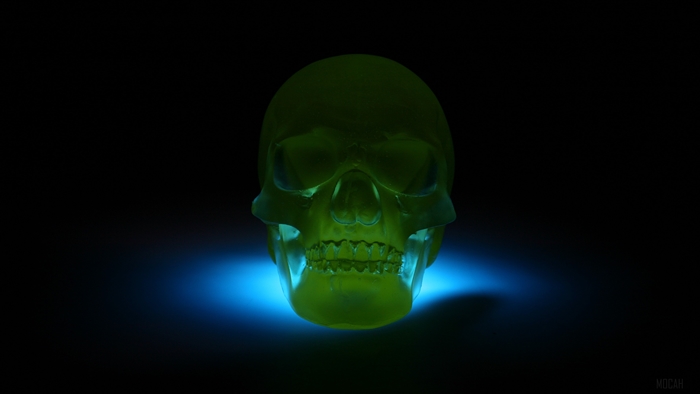 Neon green skull 3D model with blue light