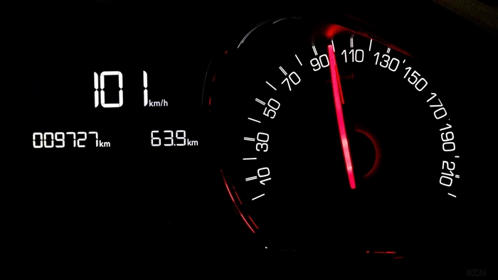 Car speedometer showing 101 km/h