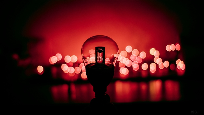Light bulb with red bokeh lights 4K