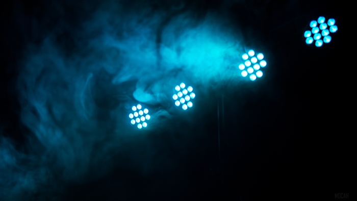Blue stage lights in smoke 4K