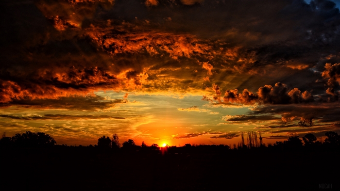 Dramatic Orange Sunset with Dark Clouds 4K