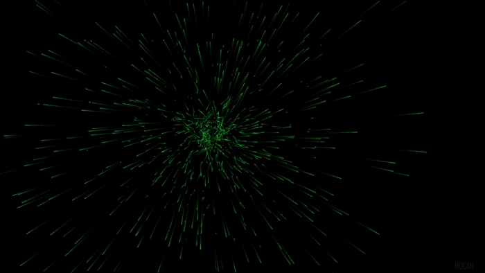 Green sparks exploding on a dark background 4K