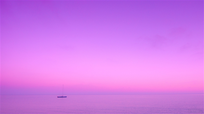 Sailboat on lilac sea at sunset 4K