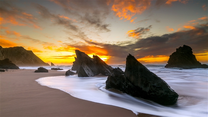 Large Rocks On Beach Shore