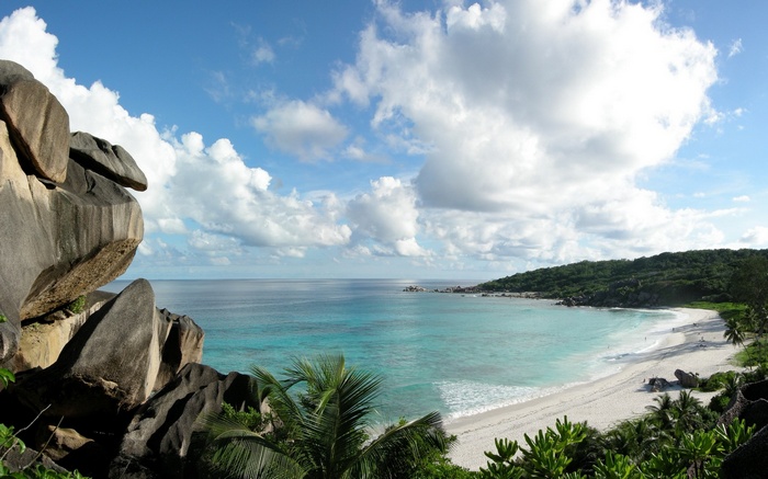 Tropical beach with granite boulders and turquoise water