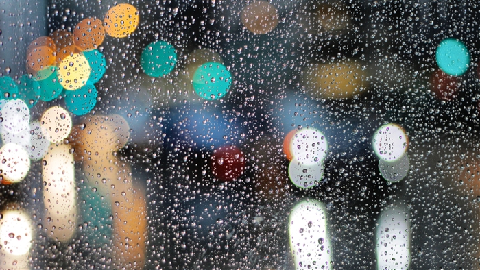 Rainy Day Bokeh Lights on Glass 4K