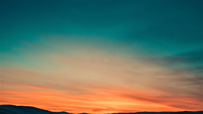 Sunset Over Snow Covered Mountains 4K