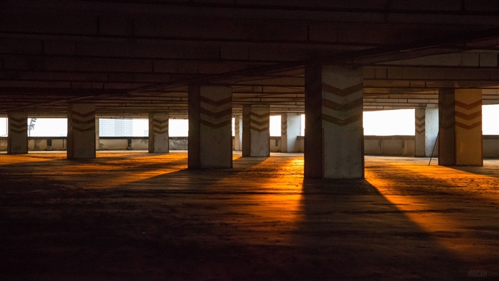 Empty Parking Lot with Morning Sunbeams 4K