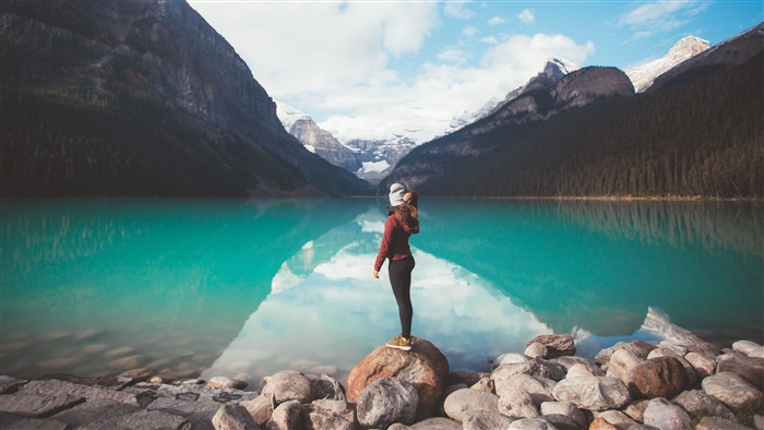 Girl Standing on Rock by Turquoise Lake 4K