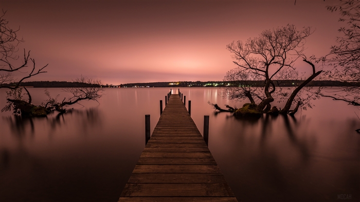 Wooden Pier on a Lake at Dusk