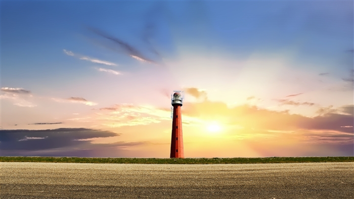 Lighthouse at Sunset with Dramatic Sky