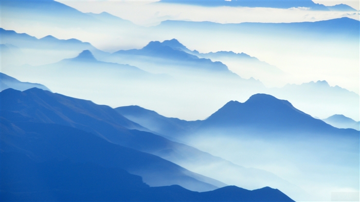 Aerial View Of Mountains In Fog 4K